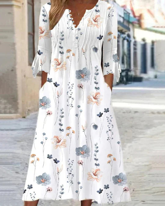 Robe midi tendance à motif floral avec poches et manches 3/4