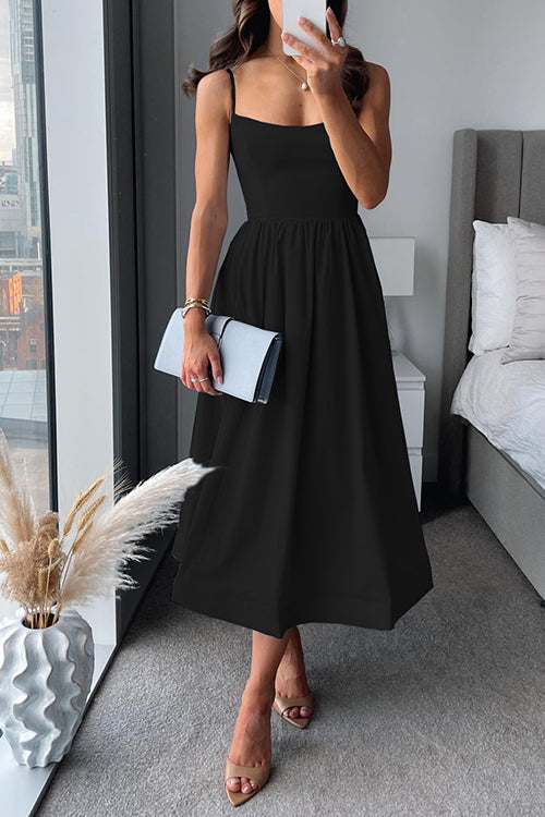 Robe midi en A bretelles spaghetti et ceinture ajustable élégante
