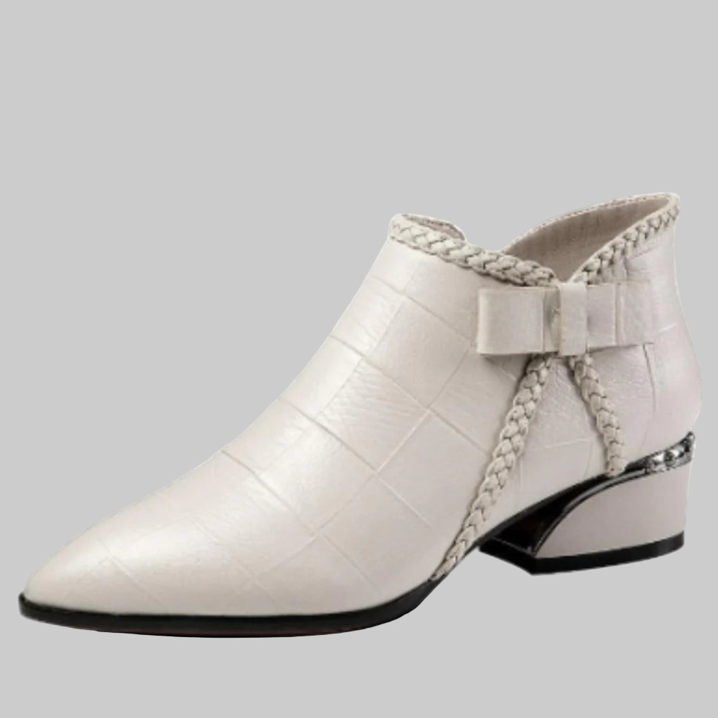 Low ankle boots with openwork cutouts in boho style