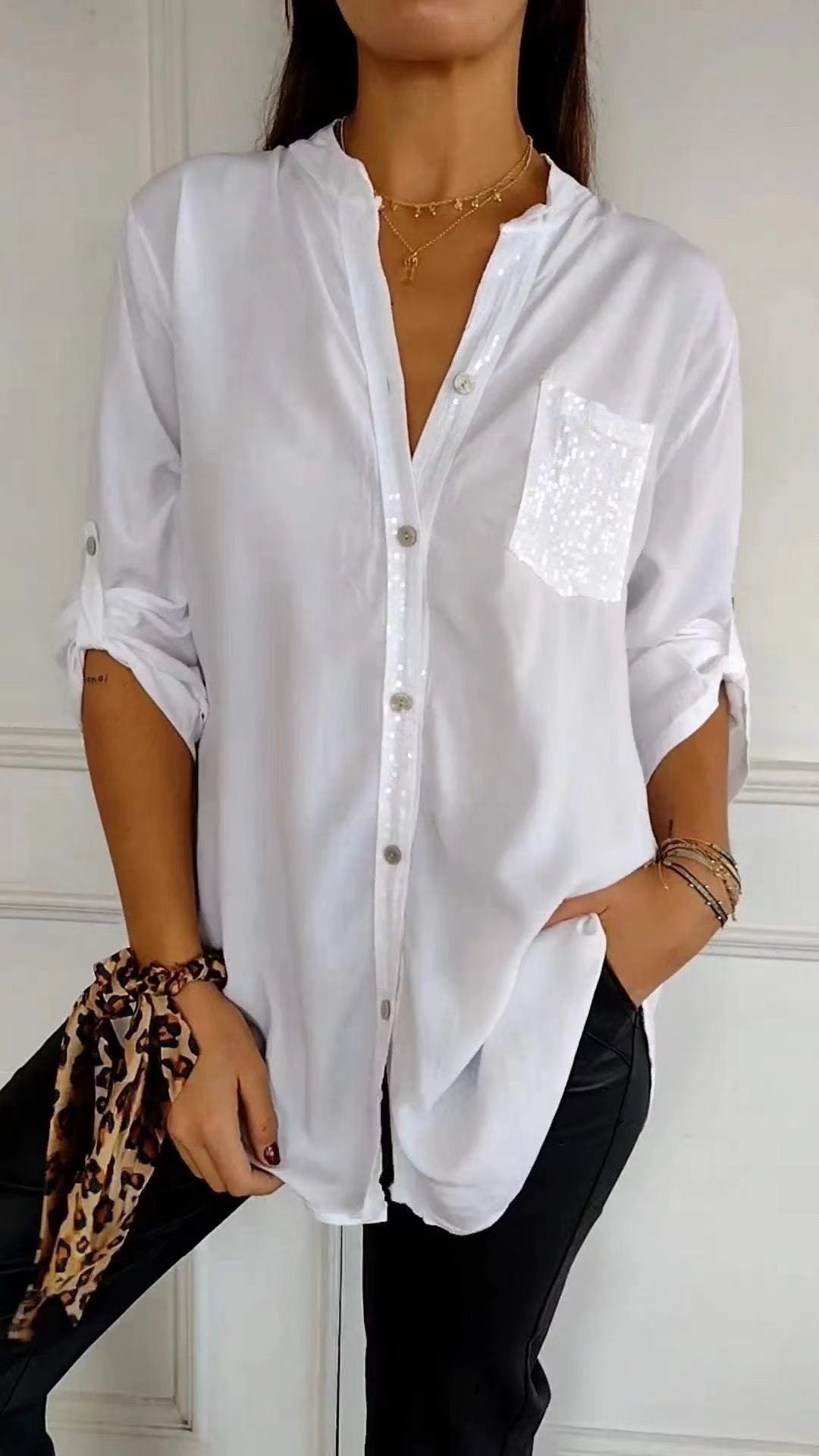 Camicia con tasca di paillettes ed effetto scintillante