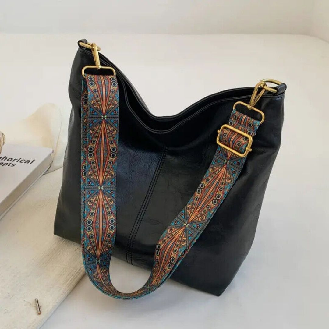 Sac à main élégant avec bandoulière décorative raffinée