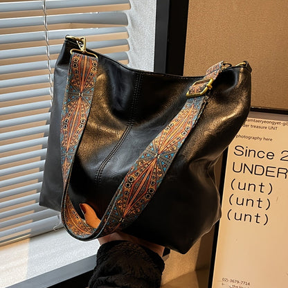 Sac à main élégant avec bandoulière décorative raffinée