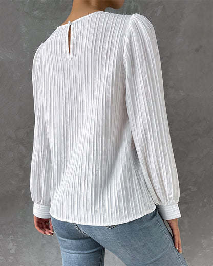 Blouse à manches bouffantes au style romantique
