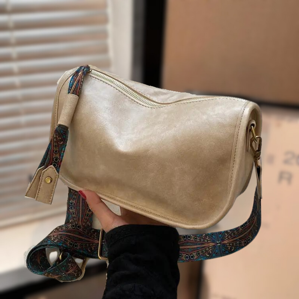 Un sac à bandoulière distinctif au design élégant et raffiné