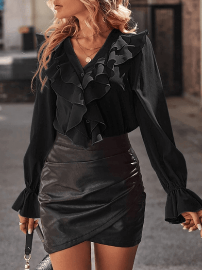 Chemise à volants boutonnée col jabot manches longues femme élégante