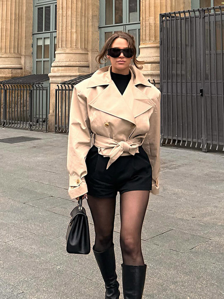 Short women's trench coat with wide collar and waist belt