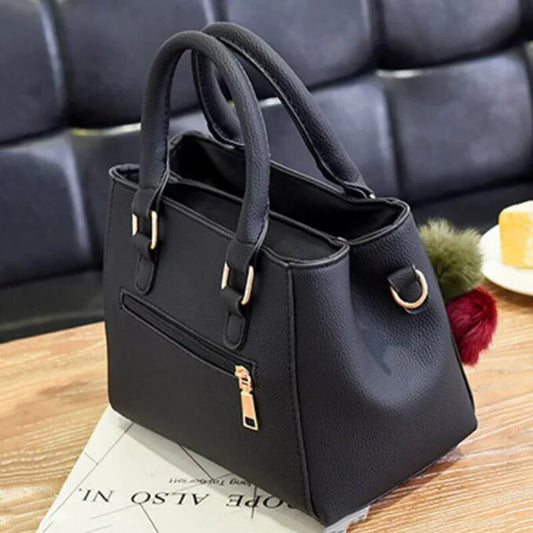 Trendy handbag for women with practical and elegant key holder