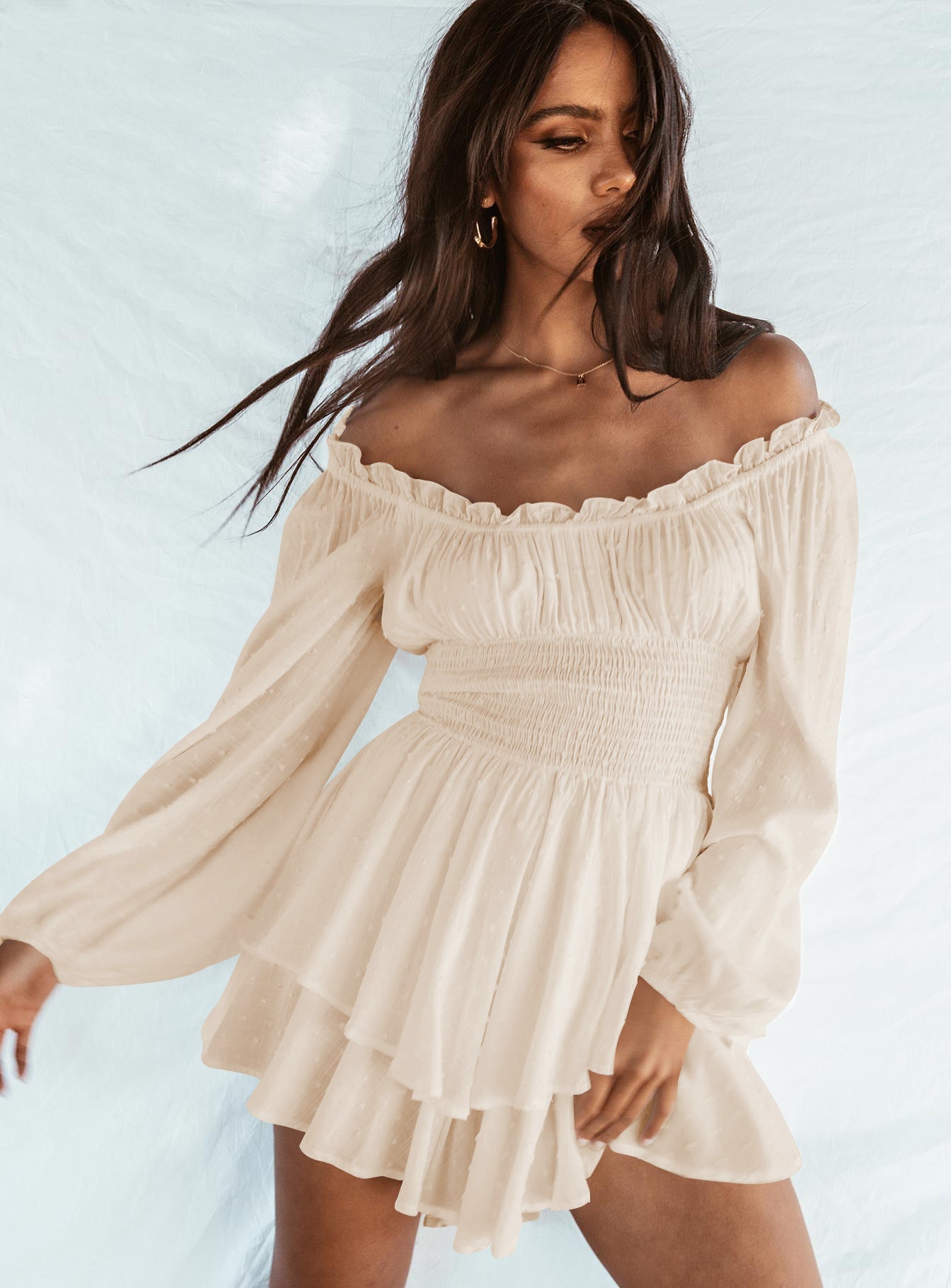 Ruffled dress with off-shoulder neckline, elegant and feminine