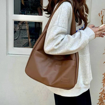 Sac à bandoulière élégant et pratique pour vos déplacements quotidiens