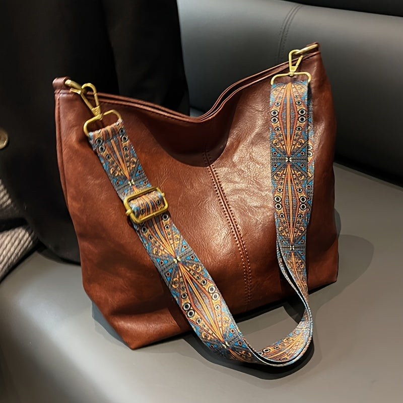 Sac à main élégant avec bandoulière décorative raffinée