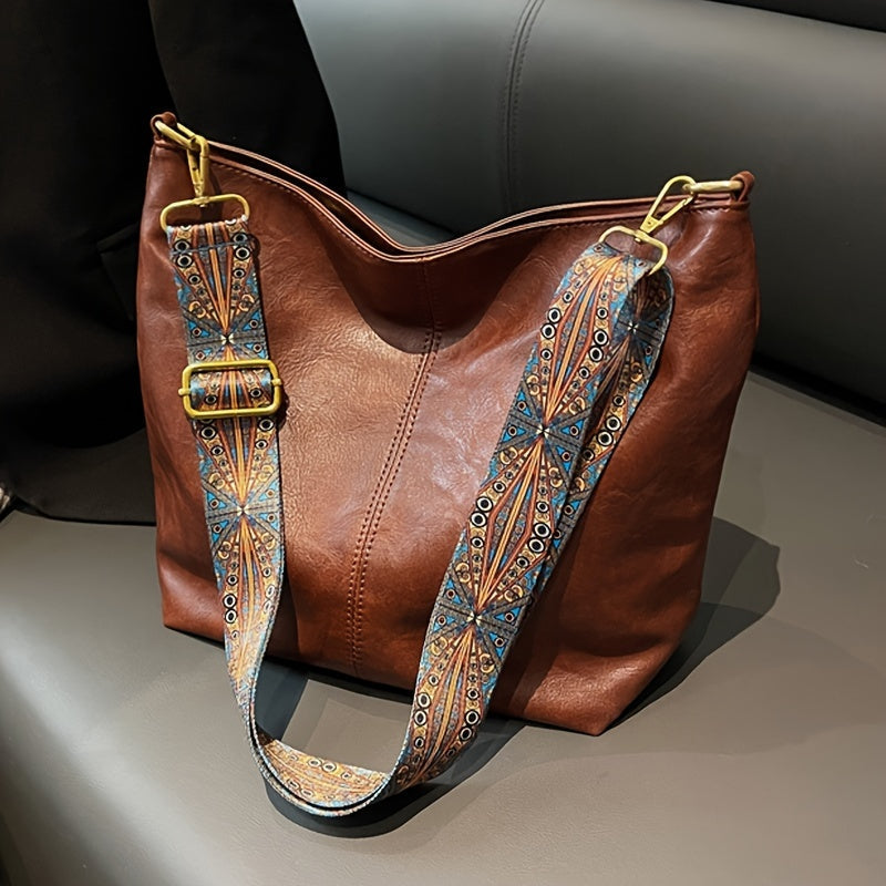 Sac à main élégant avec bandoulière décorative raffinée